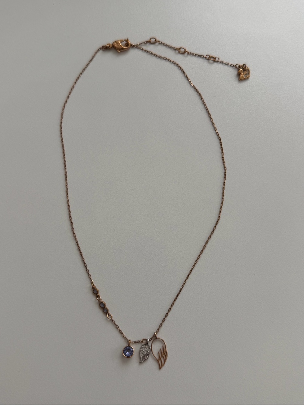 Swarovski Rose Gold Necklace with Purple Crystal and Wing Charms